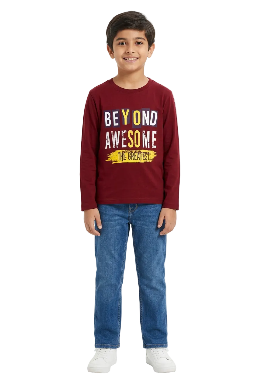 Boy wearing a maroon full-sleeve printed T-shirt on a white background.