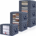 Stack of navy quilted-pattern storage bags with clear PVC fronts showing folded clothes inside