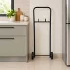 Black gas cylinder trolley in a kitchen setting